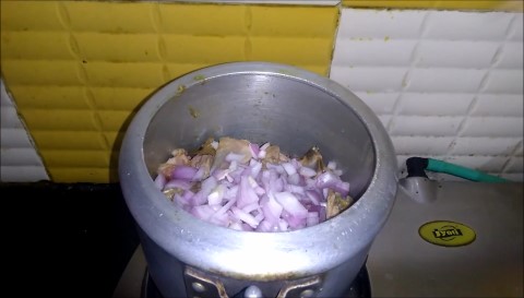 Add Mutton and Chopped onions and mix.