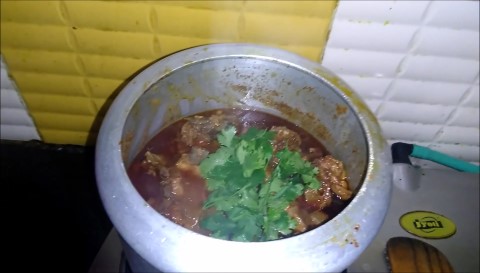 Add fresh Coriander and mix. Let Rajasthani Mutton Curry Laal Maas cook till gravy thickens
