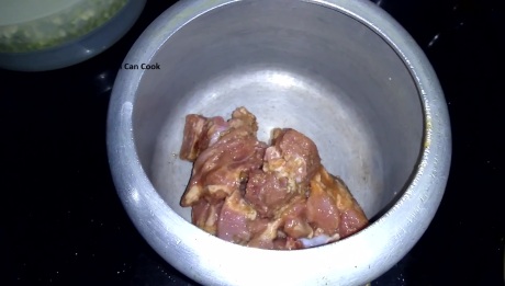 Take a pressure cooker and add mutton pieces