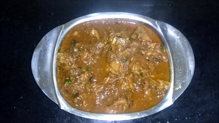 Transfer Simple Indian mutton curry to the serving dish